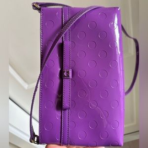 Patent leather late spade crossbody bag